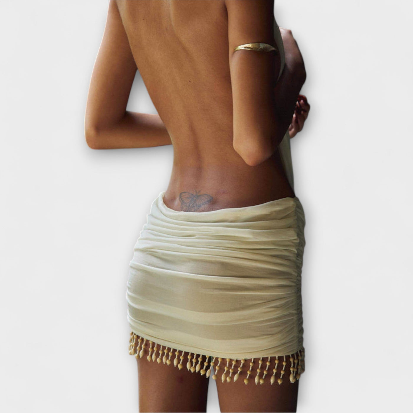 Nyari – Drapiertes Minikleid mit Perlenbesatz