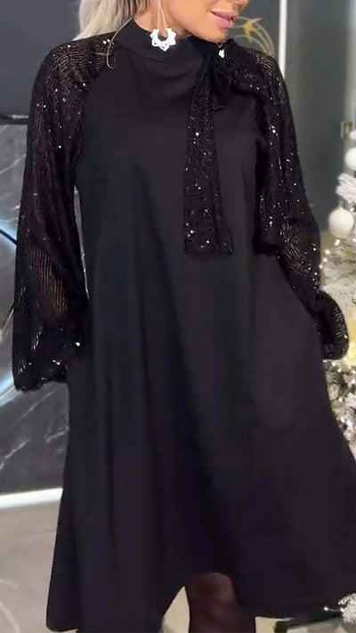 Damenkleid mit Patchwork und glänzenden Pailletten