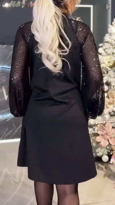 Damenkleid mit Patchwork und glänzenden Pailletten