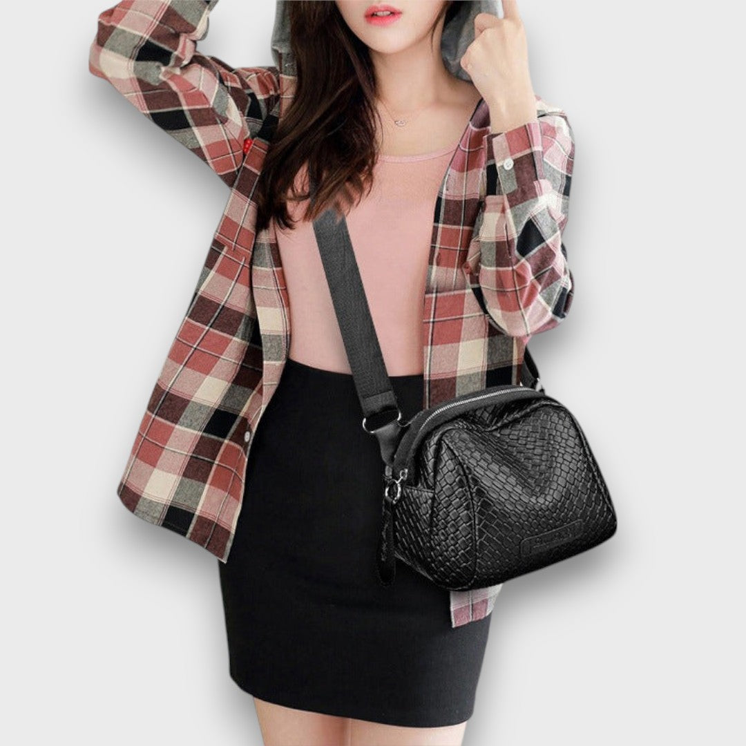 Bronelle – Geflochtene Crossbody-Tasche in Muschelform