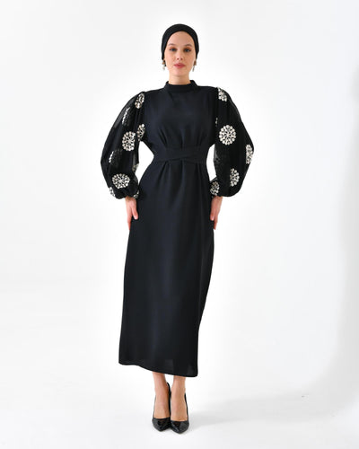 Elegantes Kleid mit Stickerei und Ballonärmeln