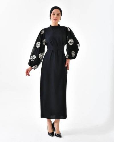 Elegantes Kleid mit Stickerei und Ballonärmeln