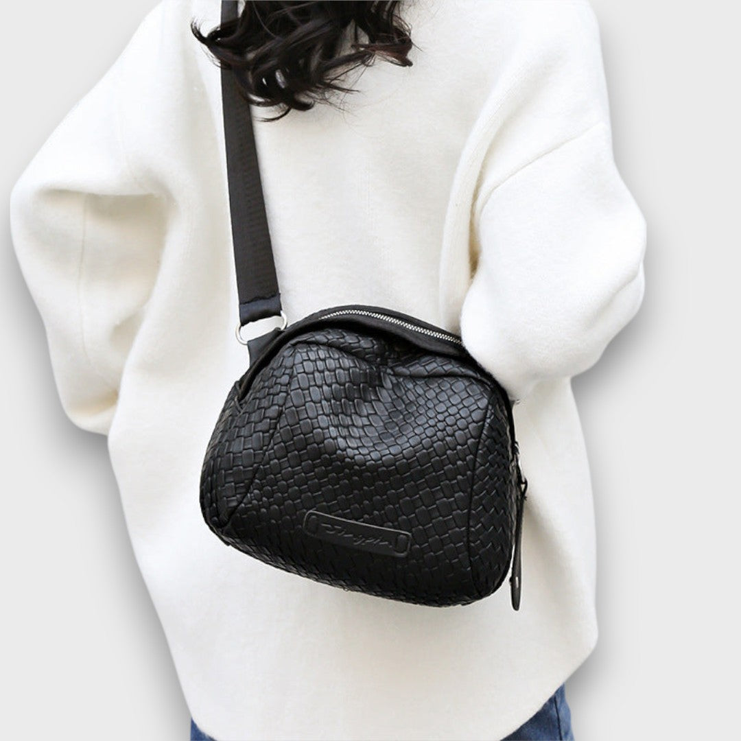 Bronelle – Geflochtene Crossbody-Tasche in Muschelform