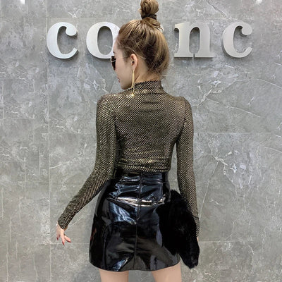 Glänzendes Damen-Rollkragen-Shirt mit eleganter Optik