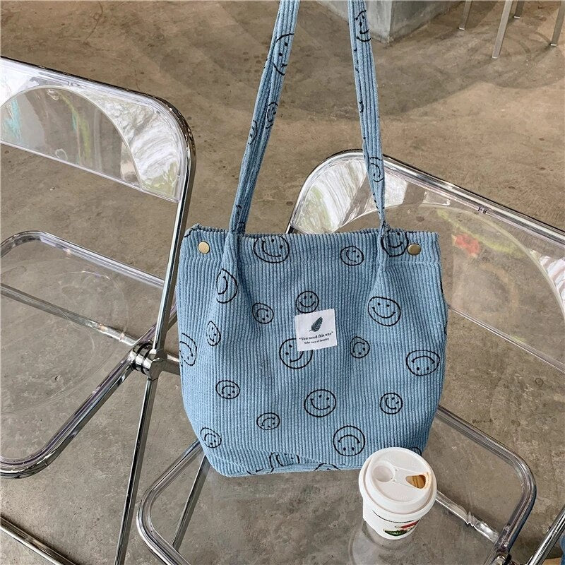 Jimena | Smiley-Tasche aus weichem Kordstoff