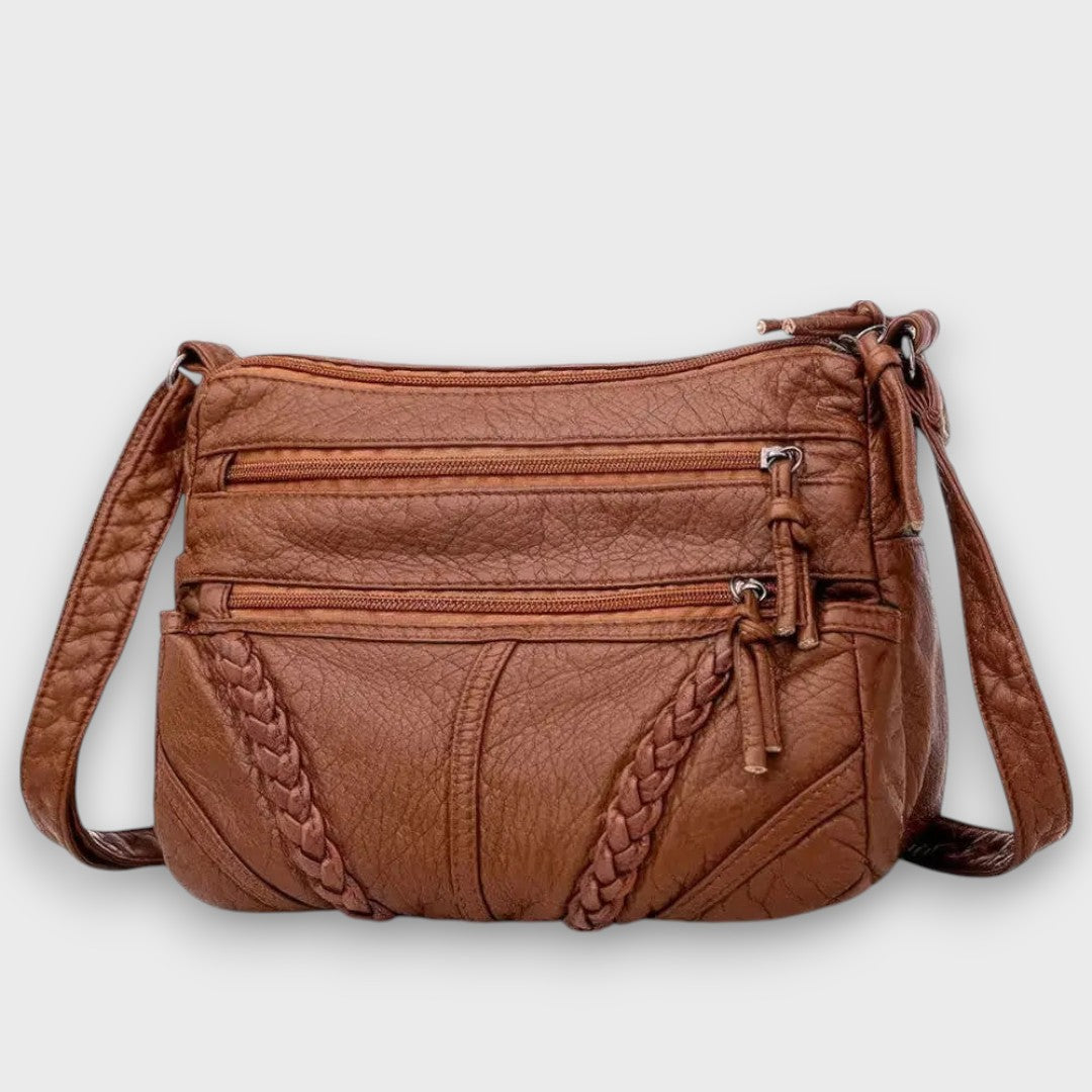 Tirella – Crossbody-Tasche mit Flechtdetail