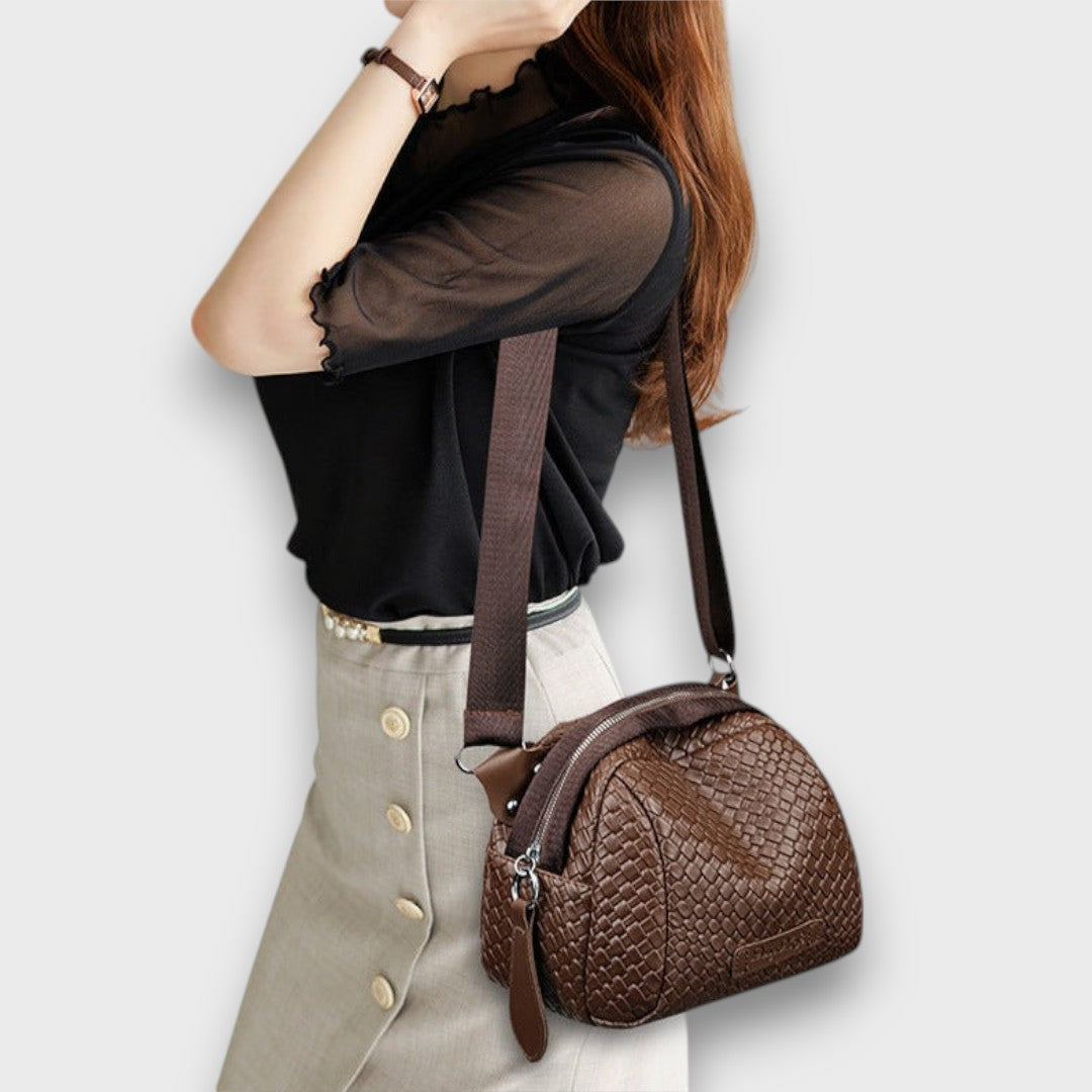 Bronelle – Geflochtene Crossbody-Tasche in Muschelform