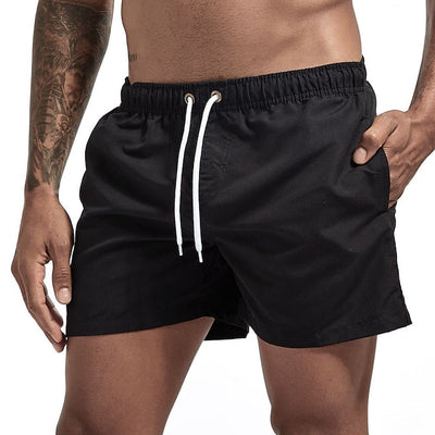 Einfarbige Strandshorts mit Kordelzug - Merk