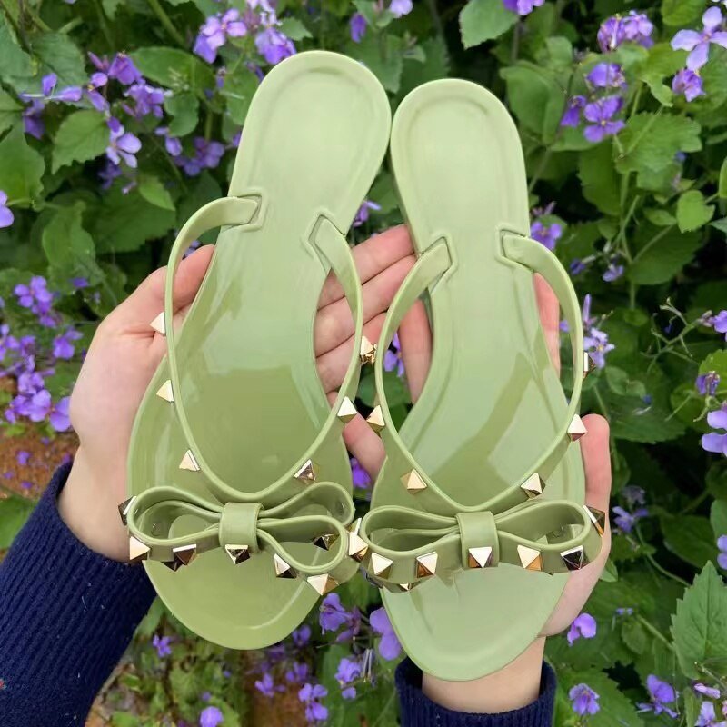 Nikki® | Flip-Flops-Sandalen mit Schleife und Nieten